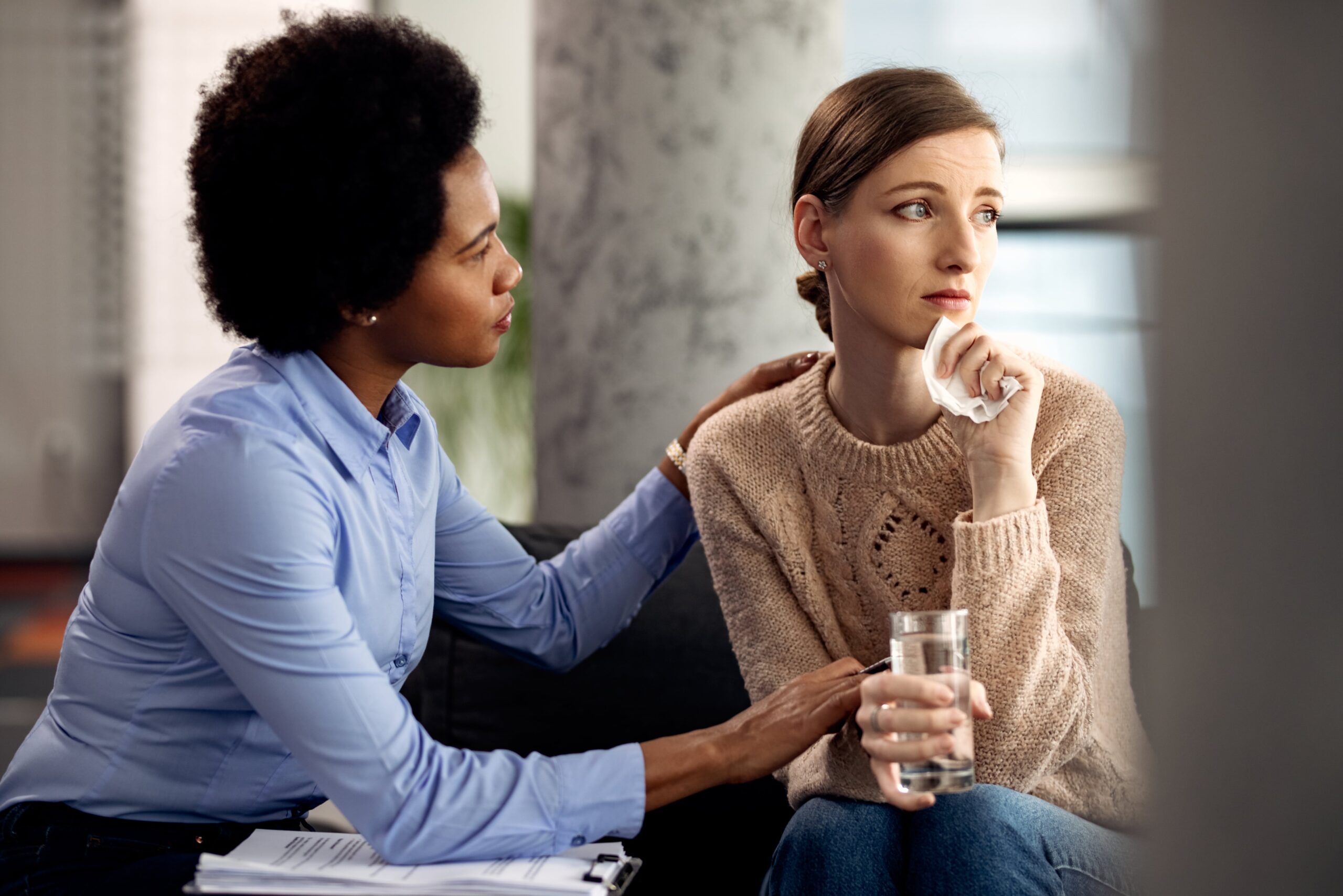 depressed woman being consoled by her psychotherap 2024 12 13 18 34 31 utc min scaled 2