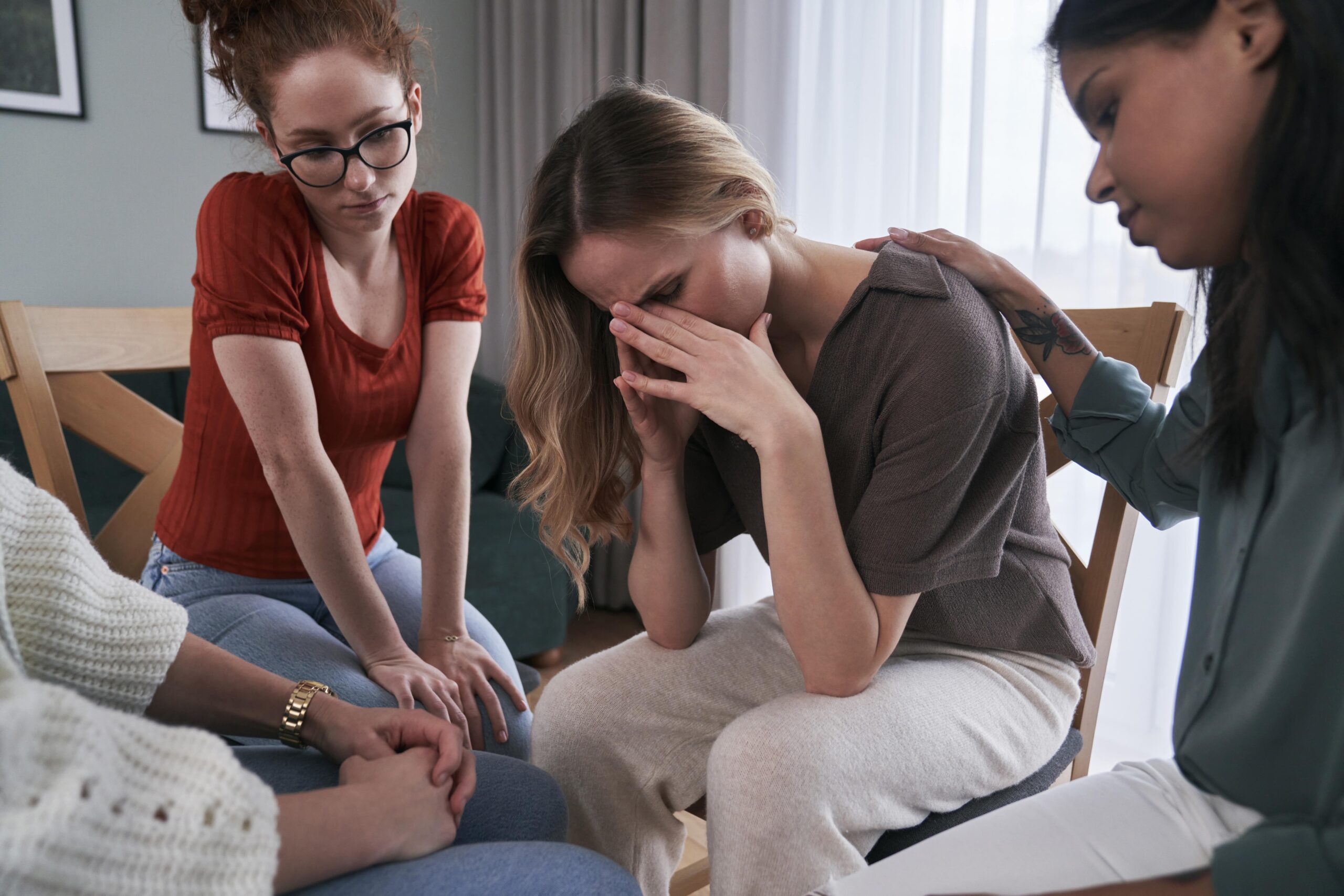 group of women on group psychotherapy consoling a 2024 12 05 17 22 44 utc min scaled 2
